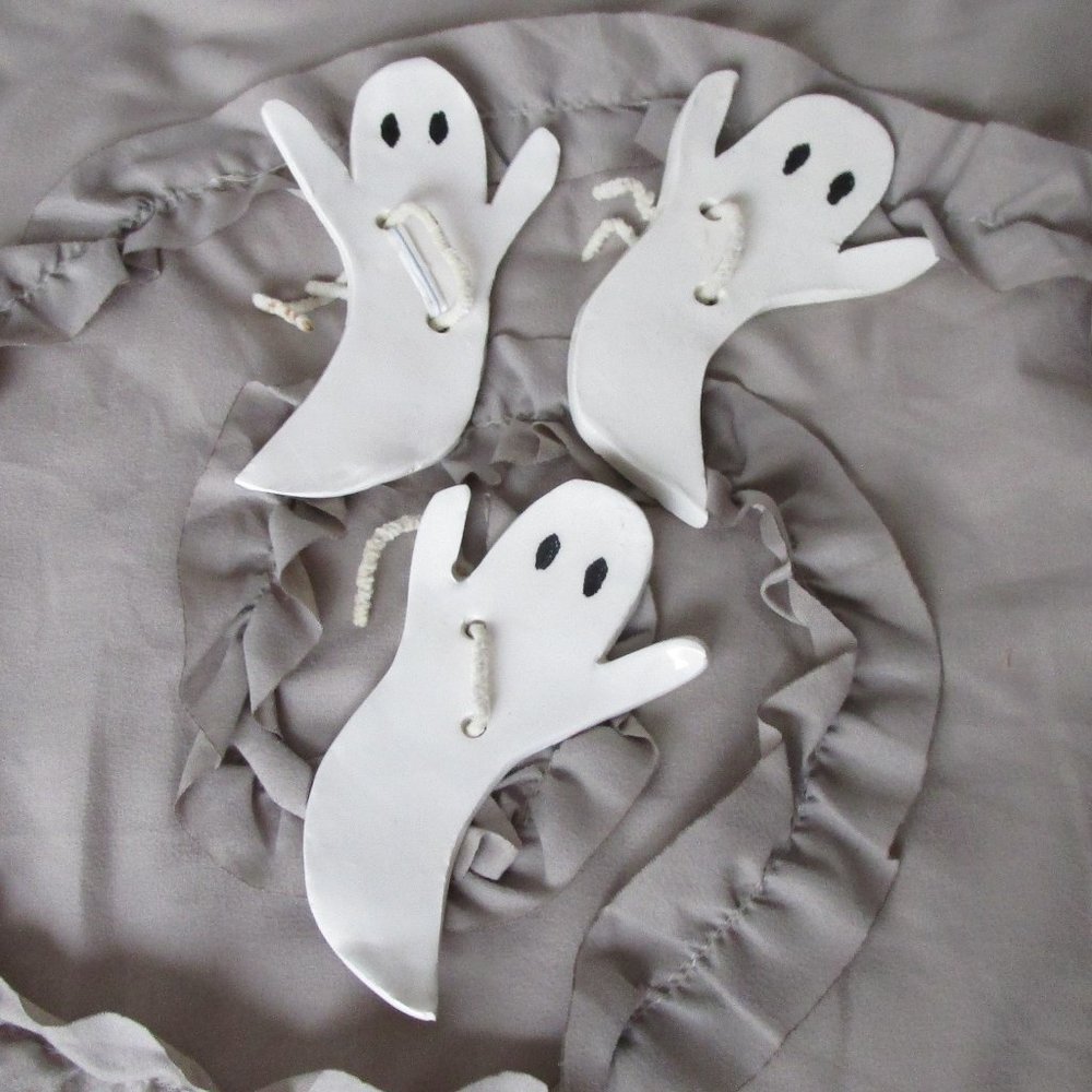 set of tie-on ceramic ornaments